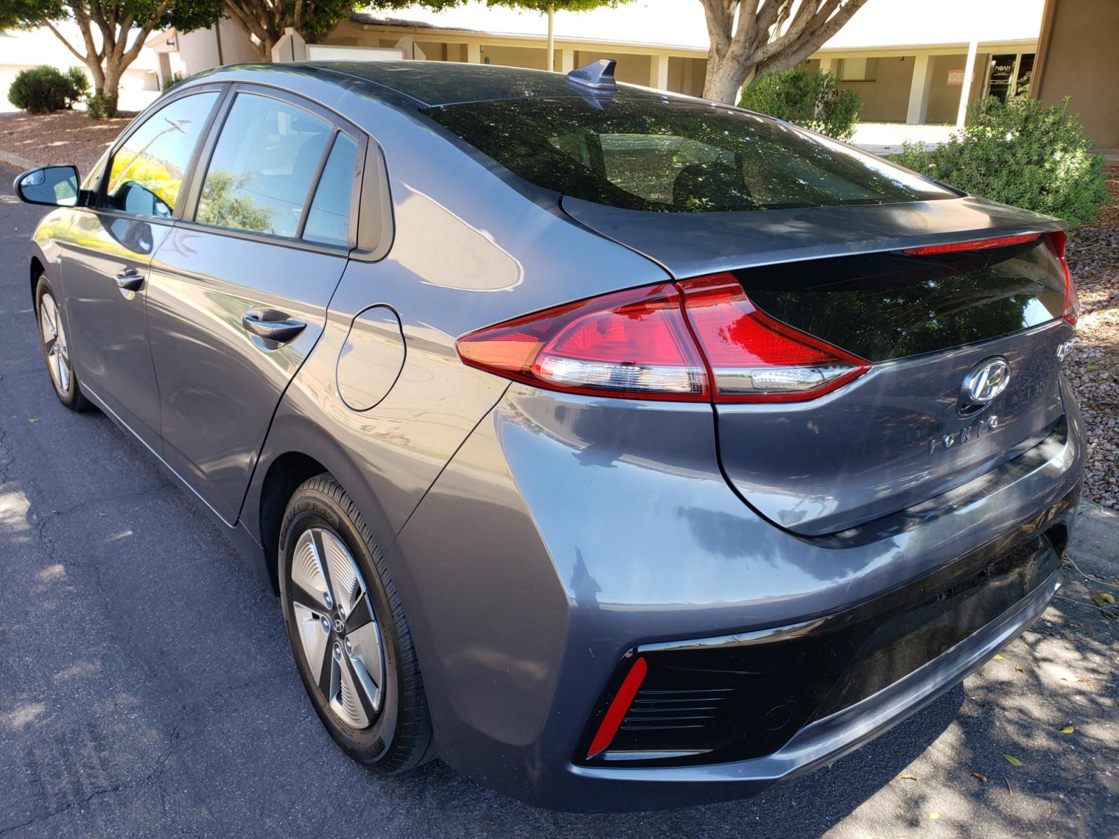 2019 /gray and lite gray Hyundai Ioniq Hybrid Blue (KMHC65LC7KU) with an 1.6L L4 DOHC 16V HYBRID engine, 6A transmission, located at 323 E Dunlap Ave., Phoenix, AZ, 85020, (602) 331-9000, 33.567677, -112.069000 - 2019 Hyundai Ioniq Hybrid,......A Must See!! No accidents, Ice cold AC. The car is gorgeous inside and out. Power windows, Power door locks, Touch screen Stereo, Phone sync, Bluetooth, Satellite compatible, backup camera, Beautiful gray and lite gray interior with dark gray cloth seats in near perfe - Photo #5
