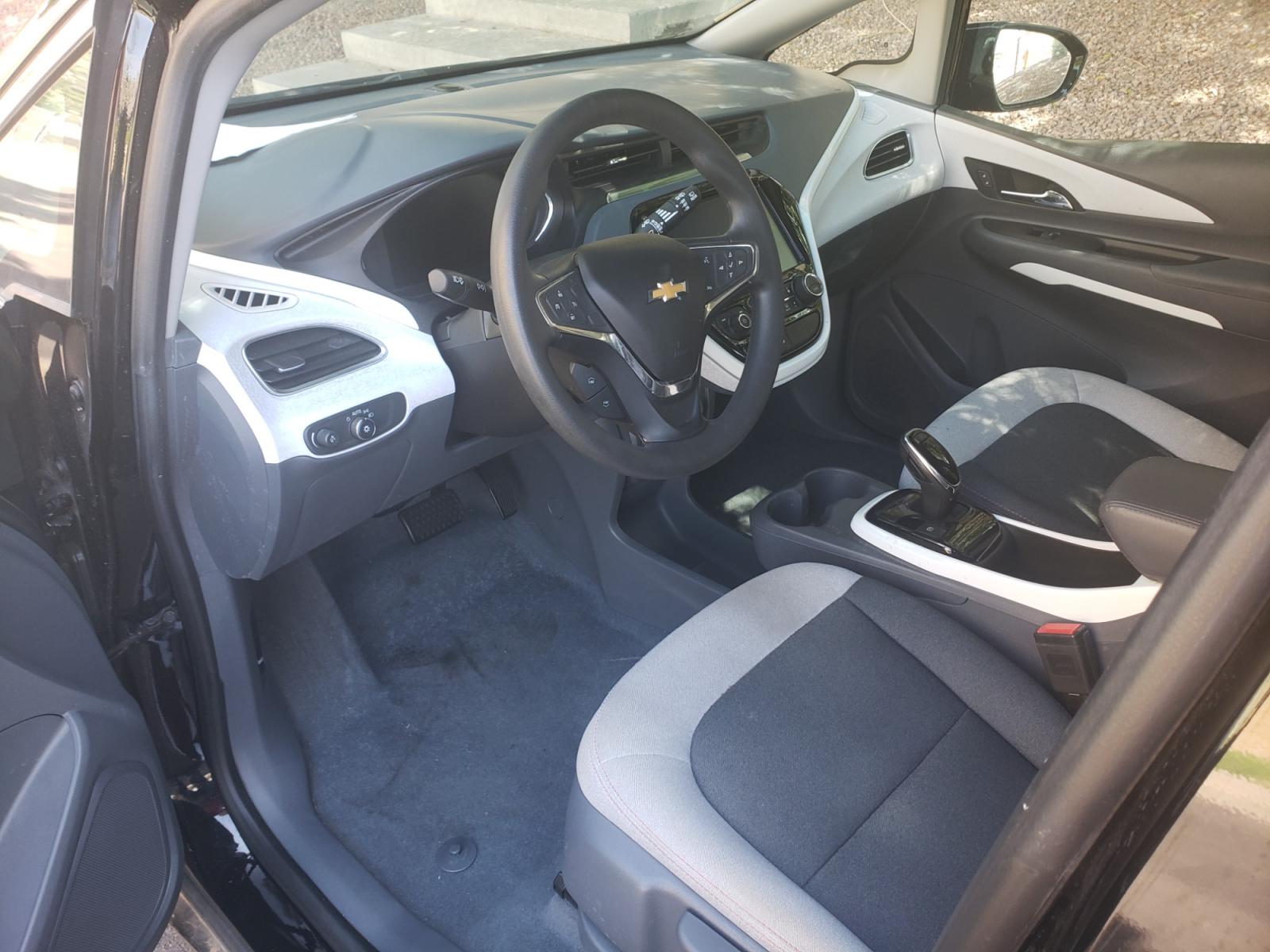 2018 /gray and black Chevrolet Bolt EV LT (1G1FW6S02J4) with an ELECTRIC engine, 1A transmission, located at 323 E Dunlap Ave., Phoenix, AZ, 85020, (602) 331-9000, 33.567677, -112.069000 - 2018 Chevrolet Bolt LT,.......A Must See!! ONLY 49K MILES!!!.... No accidents, Ice cold AC. The car is gorgeous inside and out. Power windows, Power door locks, Touch screen Stereo, Phone sync, Bluetooth, Satellite compatible, Backup camera, Beautiful gray and black interior with gray cloth seats in - Photo #9