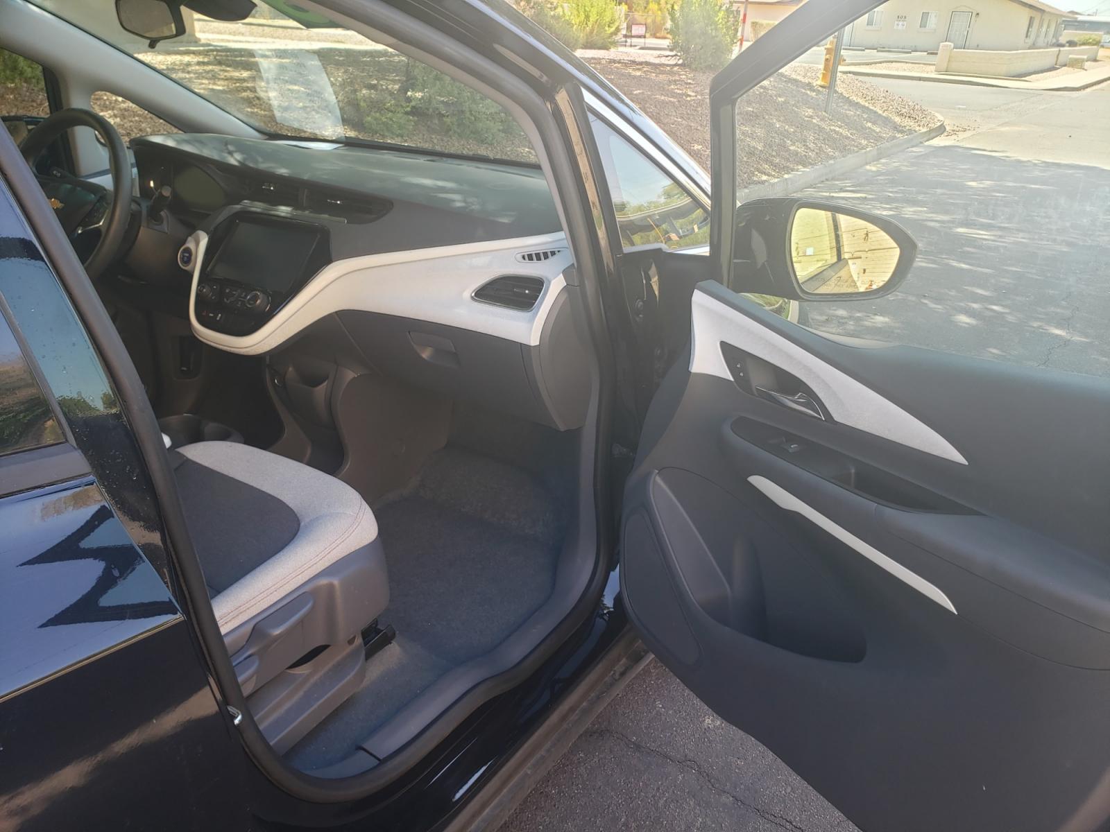 2018 /gray and black Chevrolet Bolt EV LT (1G1FW6S02J4) with an ELECTRIC engine, 1A transmission, located at 323 E Dunlap Ave., Phoenix, AZ, 85020, (602) 331-9000, 33.567677, -112.069000 - 2018 Chevrolet Bolt LT,.......A Must See!! ONLY 49K MILES!!!.... No accidents, Ice cold AC. The car is gorgeous inside and out. Power windows, Power door locks, Touch screen Stereo, Phone sync, Bluetooth, Satellite compatible, Backup camera, Beautiful gray and black interior with gray cloth seats in - Photo #13