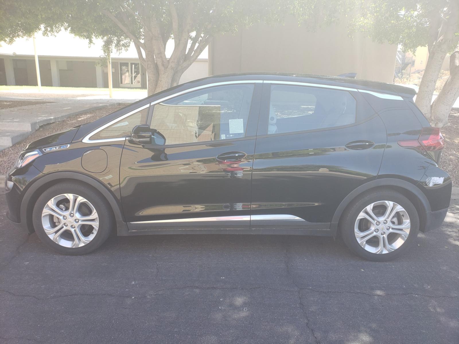 2018 /gray and black Chevrolet Bolt EV LT (1G1FW6S02J4) with an ELECTRIC engine, 1A transmission, located at 323 E Dunlap Ave., Phoenix, AZ, 85020, (602) 331-9000, 33.567677, -112.069000 - 2018 Chevrolet Bolt LT,.......A Must See!! ONLY 49K MILES!!!.... No accidents, Ice cold AC. The car is gorgeous inside and out. Power windows, Power door locks, Touch screen Stereo, Phone sync, Bluetooth, Satellite compatible, Backup camera, Beautiful gray and black interior with gray cloth seats in - Photo #6