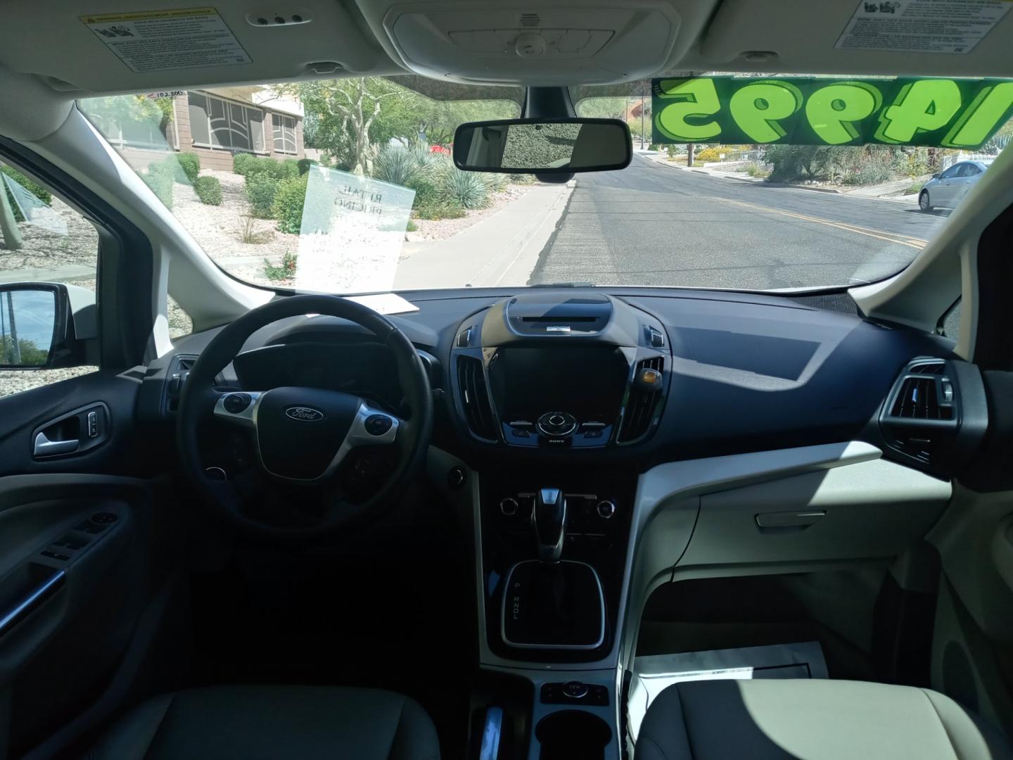 2015 WHITE /Gray and Cream Ford C-Max Energi SEL (1FADP5CU9FL) with an 2.0L L4 DOHC 16V HYBRID engine, Continuously Variable Transmission transmission, located at 323 E Dunlap Ave., Phoenix, AZ, 85020, (602) 331-9000, 33.567677, -112.069000 - 2015 Ford C-Max, ........A Must See!! No accidents, Ice cold AC. The car is gorgeous inside and out. Power windows, Power door locks, Touch screen Stereo/Cd player, Phone sync, Bluetooth, Satellite compatible, Navigation, Backup camera, Beautiful gray and black interior with gray Leather seats, Gorg - Photo#12