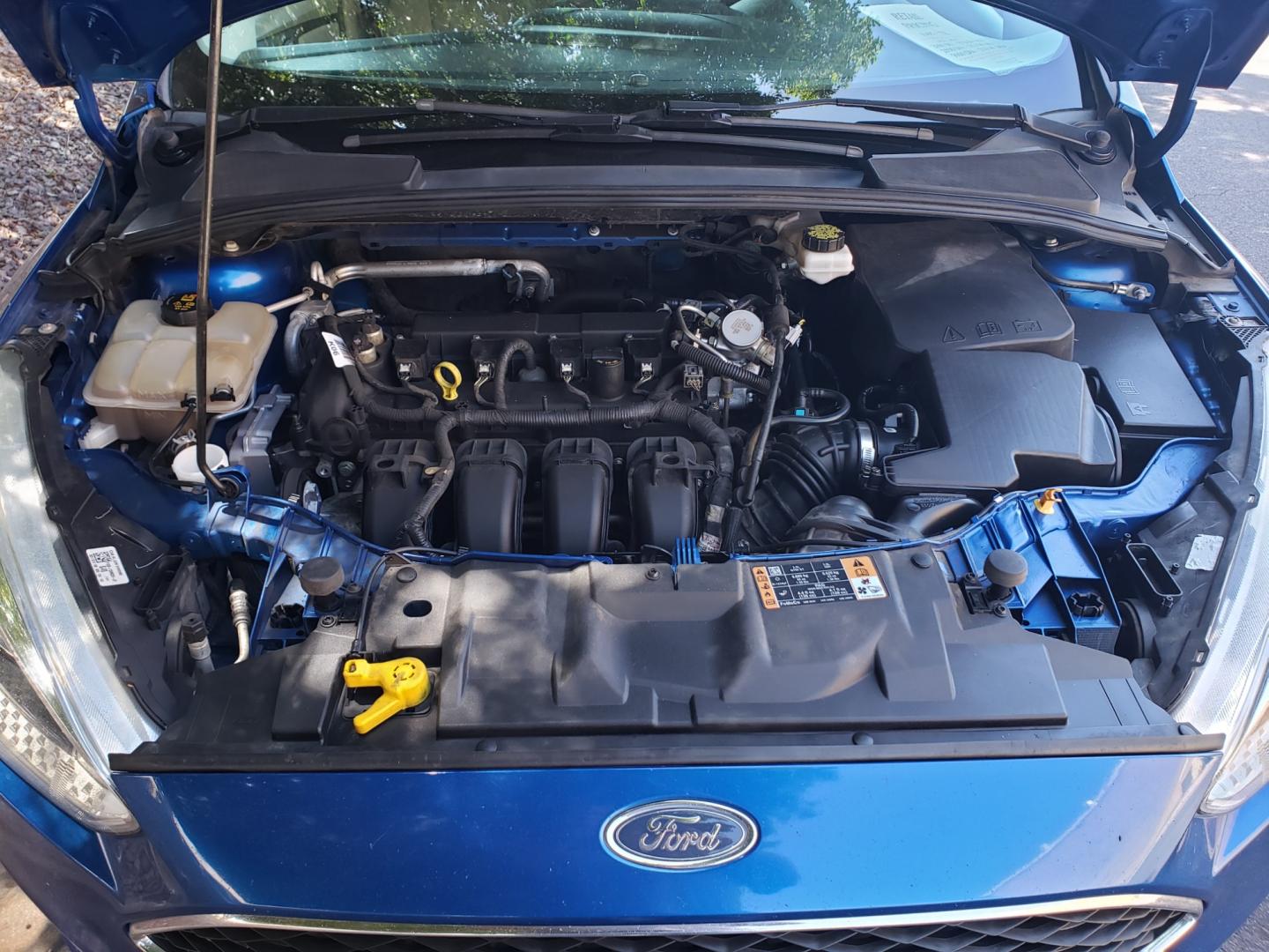 2018 /Tan and black Ford Focus SE Sedan (1FADP3F25JL) with an 2.0L L4 DOHC 16V engine, located at 323 E Dunlap Ave., Phoenix, AZ, 85020, (602) 331-9000, 33.567677, -112.069000 - Photo#18