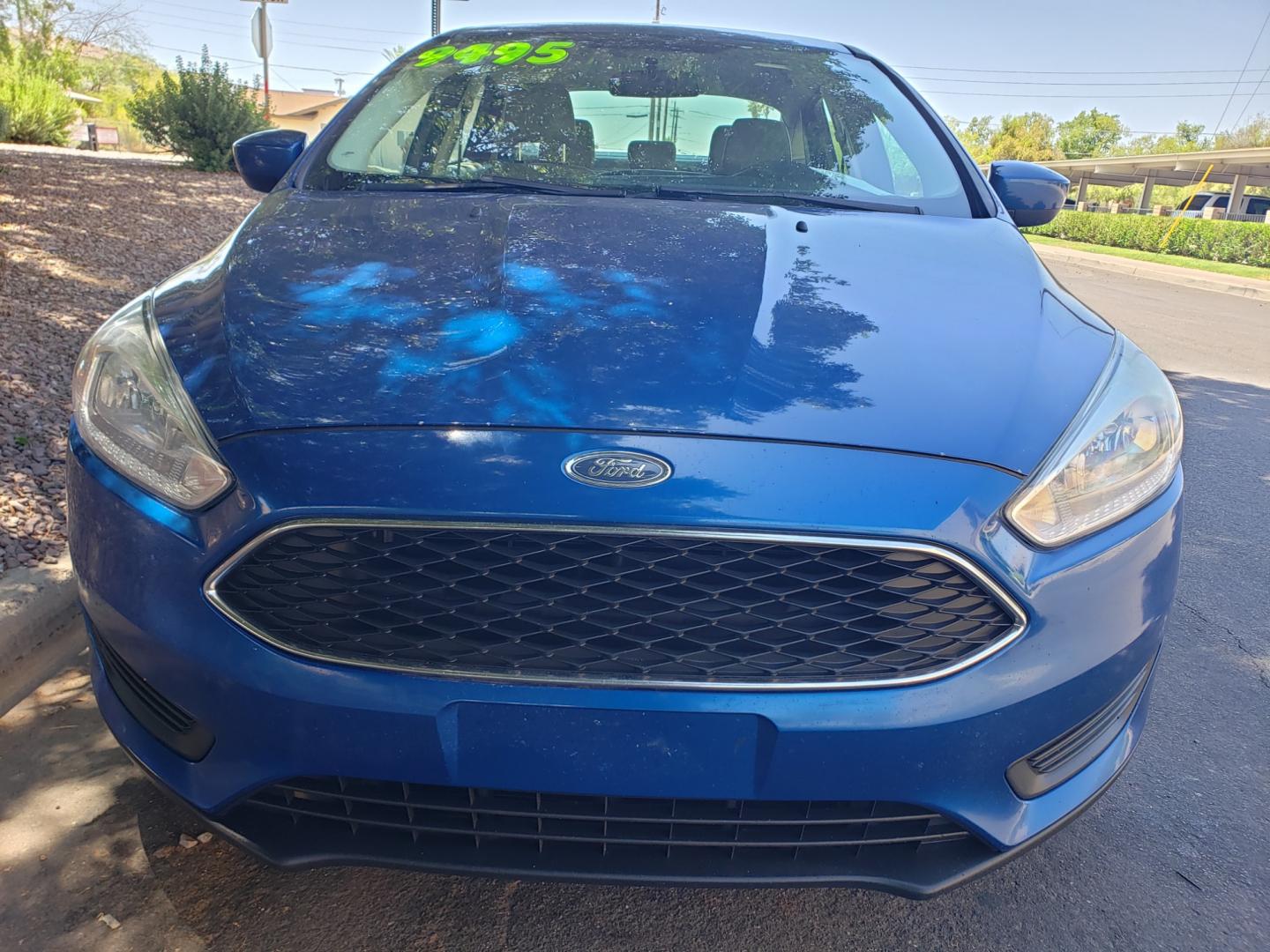 2018 /Tan and black Ford Focus SE Sedan (1FADP3F25JL) with an 2.0L L4 DOHC 16V engine, located at 323 E Dunlap Ave., Phoenix, AZ, 85020, (602) 331-9000, 33.567677, -112.069000 - Photo#1