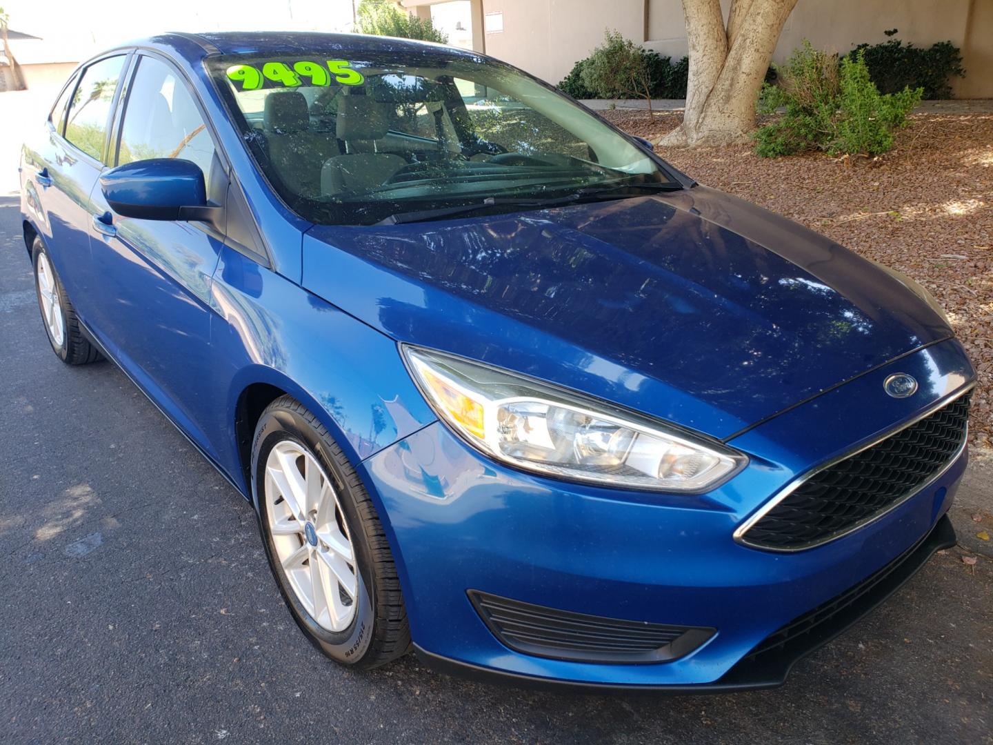 2018 /Tan and black Ford Focus SE Sedan (1FADP3F25JL) with an 2.0L L4 DOHC 16V engine, located at 323 E Dunlap Ave., Phoenix, AZ, 85020, (602) 331-9000, 33.567677, -112.069000 - Photo#2