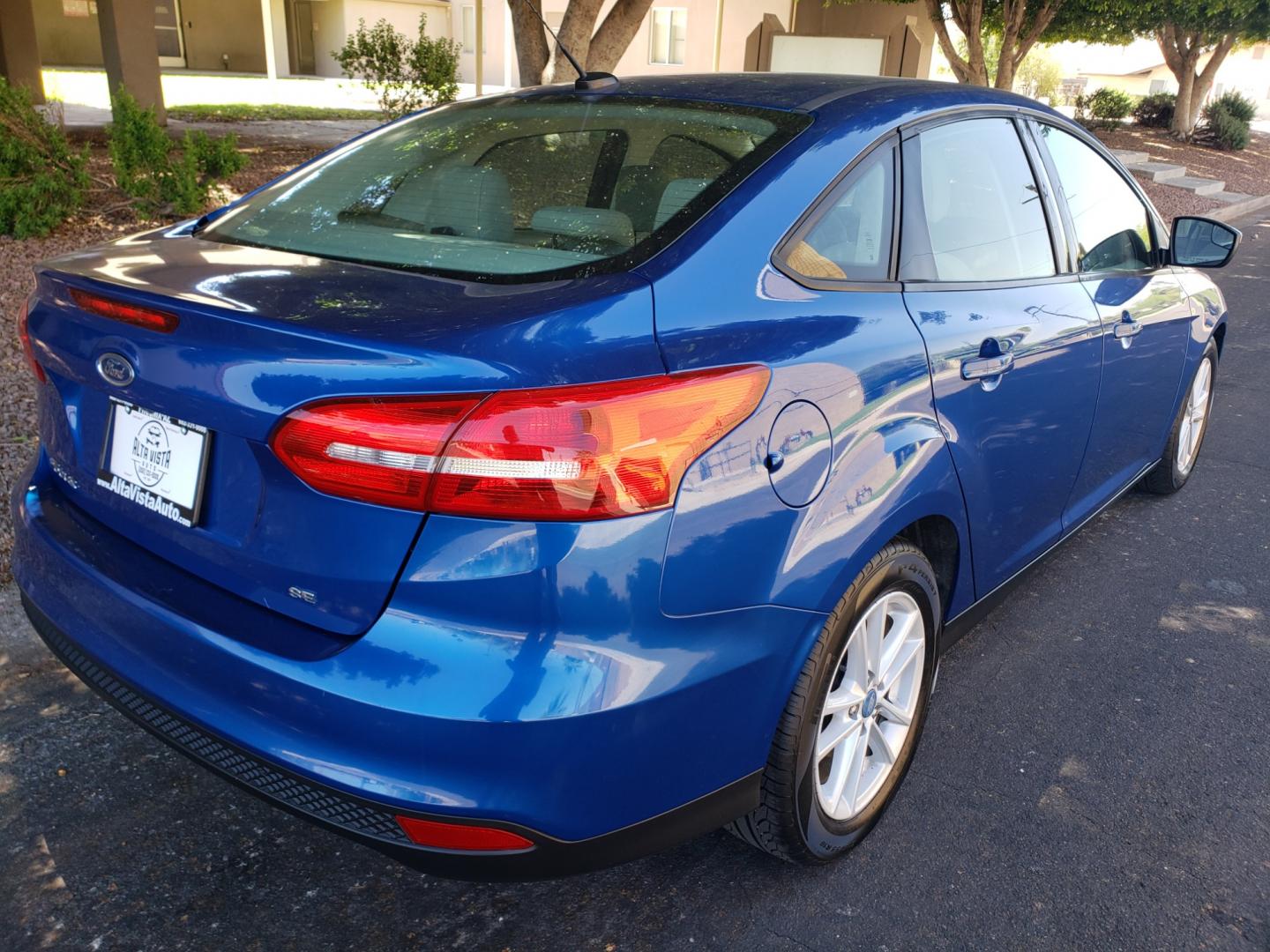 2018 /Tan and black Ford Focus SE Sedan (1FADP3F25JL) with an 2.0L L4 DOHC 16V engine, located at 323 E Dunlap Ave., Phoenix, AZ, 85020, (602) 331-9000, 33.567677, -112.069000 - Photo#3