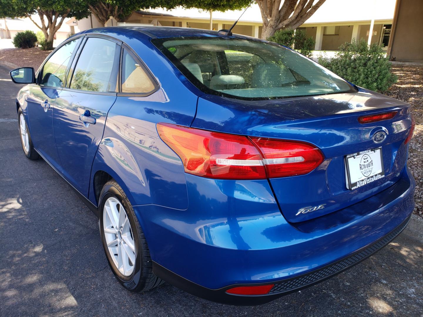 2018 /Tan and black Ford Focus SE Sedan (1FADP3F25JL) with an 2.0L L4 DOHC 16V engine, located at 323 E Dunlap Ave., Phoenix, AZ, 85020, (602) 331-9000, 33.567677, -112.069000 - Photo#5