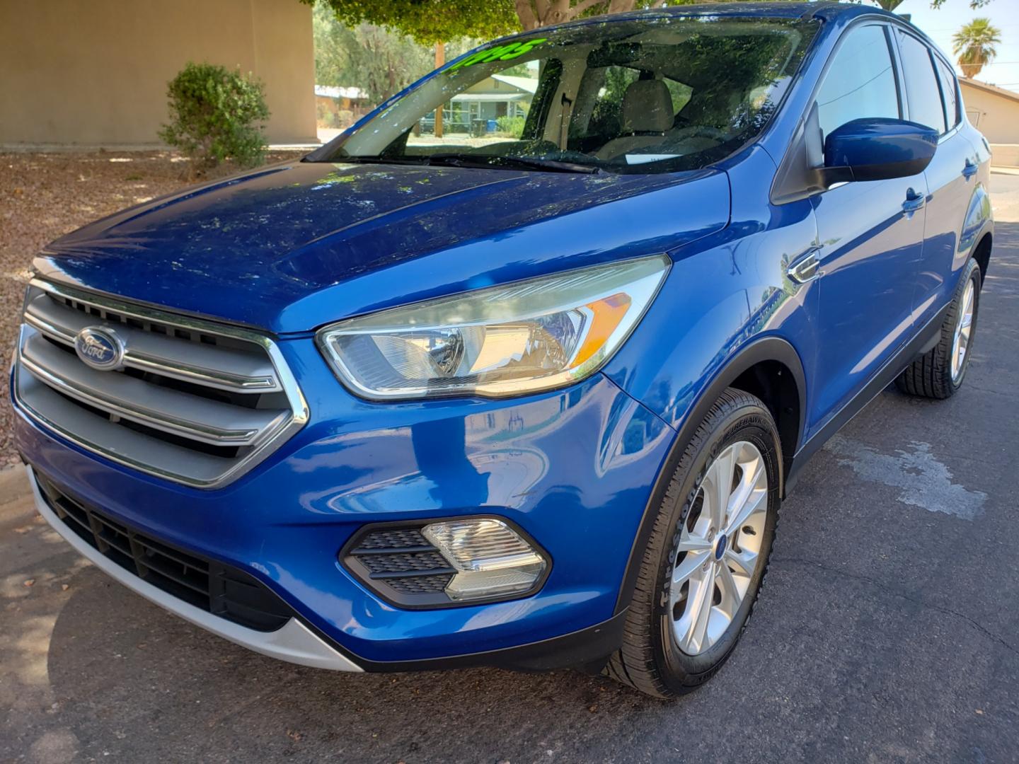 2017 /Tan and black Ford Escape SE FWD ( 1FMCU0GD4H) with an 1.5L L4 DOHC 16V engine, 6A transmission, located at 323 E Dunlap Ave., Phoenix, AZ, 85020, (602) 331-9000, 33.567677, -112.069000 - 2017 Ford Escape SE,.......EXCELLENT condition, ONLY 125K MILES!!.... Ice Cold A/C, Black and tan interior with tan cloth seats in near perfect condition, New Tires, New brakes, Tune up, Stereo/CD Player, Bluetooth, Phone sync, Backuup camera, Satellite compatible, This suv is gorgeous inside and ou - Photo#0