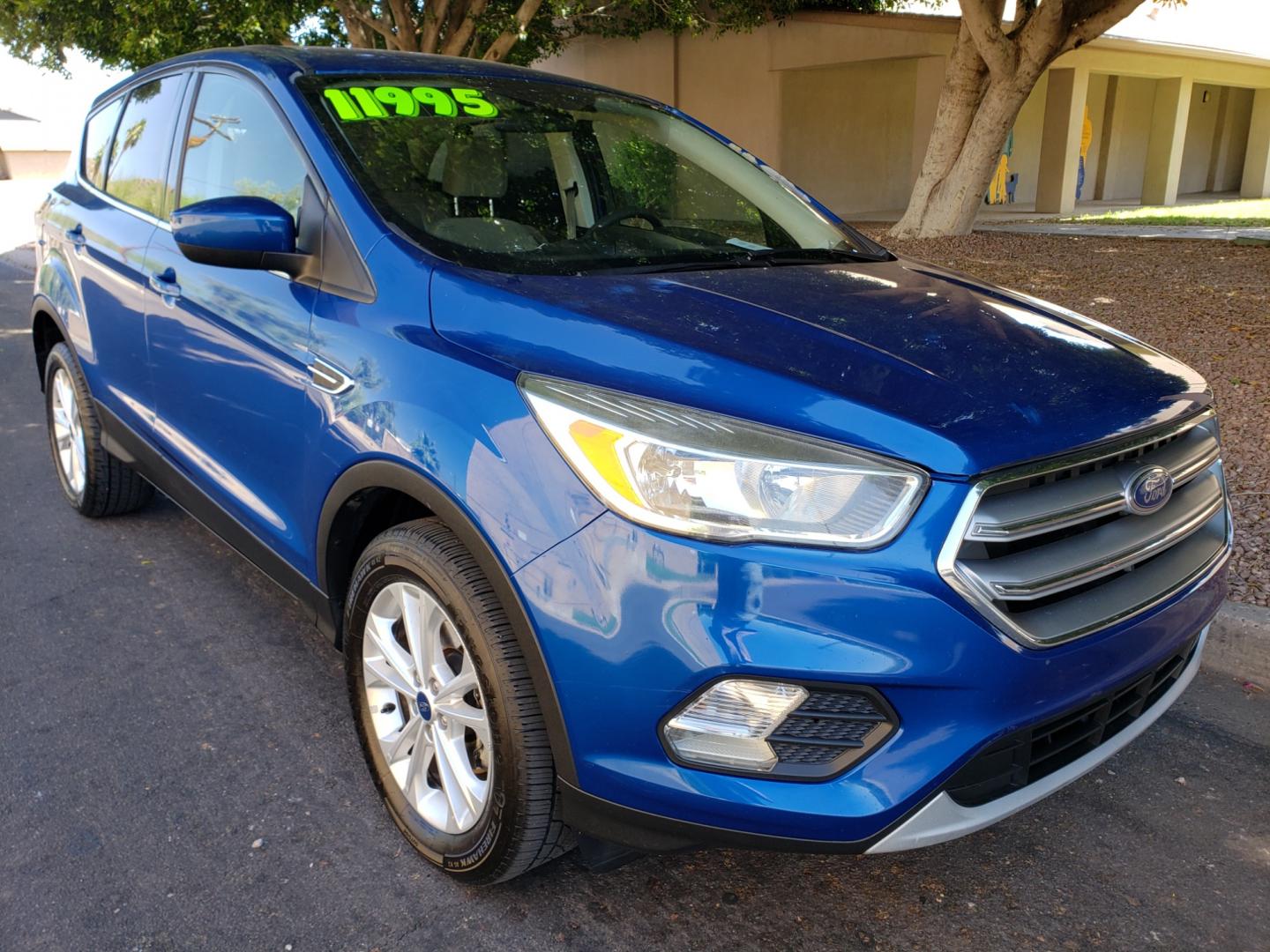 2017 /Tan and black Ford Escape SE FWD ( 1FMCU0GD4H) with an 1.5L L4 DOHC 16V engine, 6A transmission, located at 323 E Dunlap Ave., Phoenix, AZ, 85020, (602) 331-9000, 33.567677, -112.069000 - 2017 Ford Escape SE,.......EXCELLENT condition, ONLY 125K MILES!!.... Ice Cold A/C, Black and tan interior with tan cloth seats in near perfect condition, New Tires, New brakes, Tune up, Stereo/CD Player, Bluetooth, Phone sync, Backuup camera, Satellite compatible, This suv is gorgeous inside and ou - Photo#2