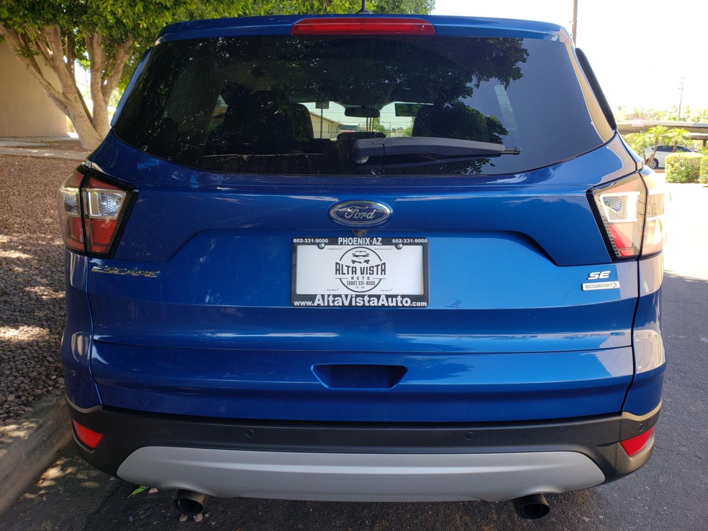 2017 /Tan and black Ford Escape SE FWD ( 1FMCU0GD4H) with an 1.5L L4 DOHC 16V engine, 6A transmission, located at 323 E Dunlap Ave., Phoenix, AZ, 85020, (602) 331-9000, 33.567677, -112.069000 - 2017 Ford Escape SE,.......EXCELLENT condition, ONLY 125K MILES!!.... Ice Cold A/C, Black and tan interior with tan cloth seats in near perfect condition, New Tires, New brakes, Tune up, Stereo/CD Player, Bluetooth, Phone sync, Backuup camera, Satellite compatible, This suv is gorgeous inside and ou - Photo#7