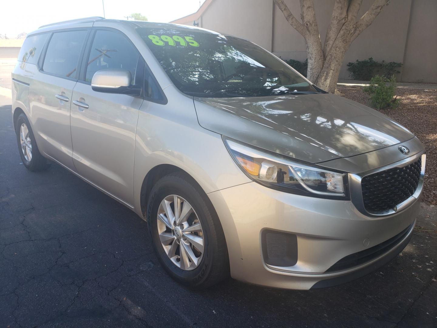 2016 /Tan and black Kia Sedona lx (KNDMB5C16G6) with an 3.3l v6 engine, 6-Speed Automatic transmission, located at 323 E Dunlap Ave., Phoenix, AZ, 85020, (602) 331-9000, 33.567677, -112.069000 - 2016 Kia Sedona LX,......EXCELLENT condition,..... A Real Must See!!.... No accidents, Clean inside and out, Power everything, Ice cold ac, Third row seating, Rear ac second and third seats, Clean Tan and black interior with Tan cloth seats in near perfect condition and the van is gorgeous. Touch sc - Photo#2