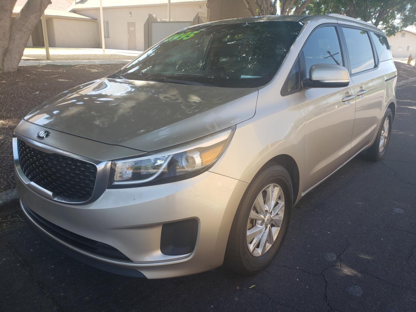 2016 /Tan and black Kia Sedona lx (KNDMB5C16G6) with an 3.3l v6 engine, 6-Speed Automatic transmission, located at 323 E Dunlap Ave., Phoenix, AZ, 85020, (602) 331-9000, 33.567677, -112.069000 - 2016 Kia Sedona LX,......EXCELLENT condition,..... A Real Must See!!.... No accidents, Clean inside and out, Power everything, Ice cold ac, Third row seating, Rear ac second and third seats, Clean Tan and black interior with Tan cloth seats in near perfect condition and the van is gorgeous. Touch sc - Photo#0