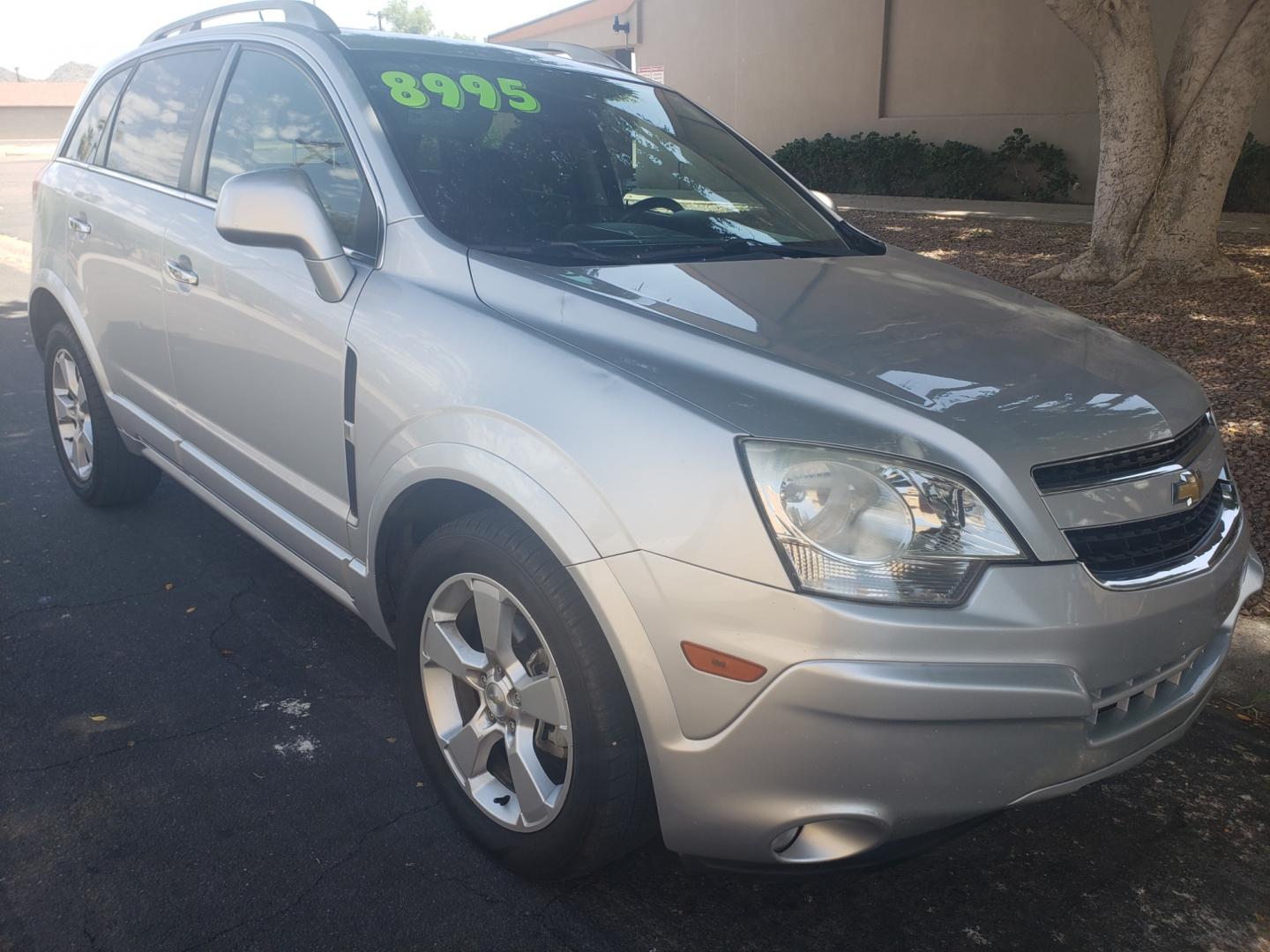 2014 /gray and black Chevrolet Captiva Sport ltz (3GNAL4EK8ES) with an 2.4L L4 DOHC 16V engine, 6-Speed Automatic transmission, located at 323 E Dunlap Ave., Phoenix, AZ, 85020, (602) 331-9000, 33.567677, -112.069000 - Photo#2