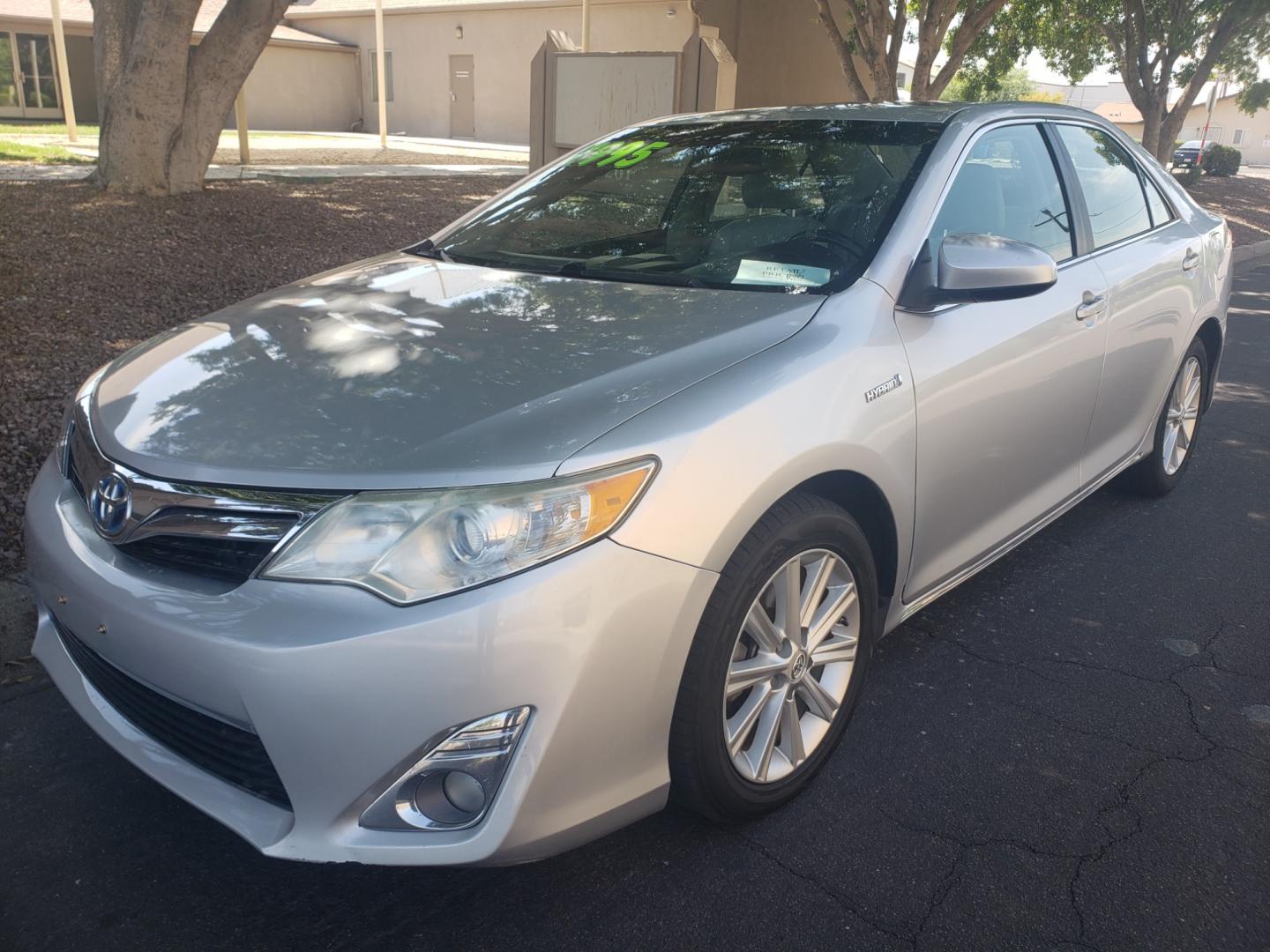 2012 /gray and black Toyota Camry Hybrid le (4T1BD1FK0CU) with an 2.5L L4 DOHC 16V HYBRID engine, Continuously Variable Transmission transmission, located at 323 E Dunlap Ave., Phoenix, AZ, 85020, (602) 331-9000, 33.567677, -112.069000 - 2012 Toyota Camry Hybrid 4dr Sdn ,.....A Must See!! No accidents, Ice cold AC. The car is gorgeous inside and out. Power windows, Power door locks, Touch screen Stereo, Phone sync, Bluetooth, Navigation, backup camera, Beautiful gray and black interior with gray leather seats in near perfect conditi - Photo#0