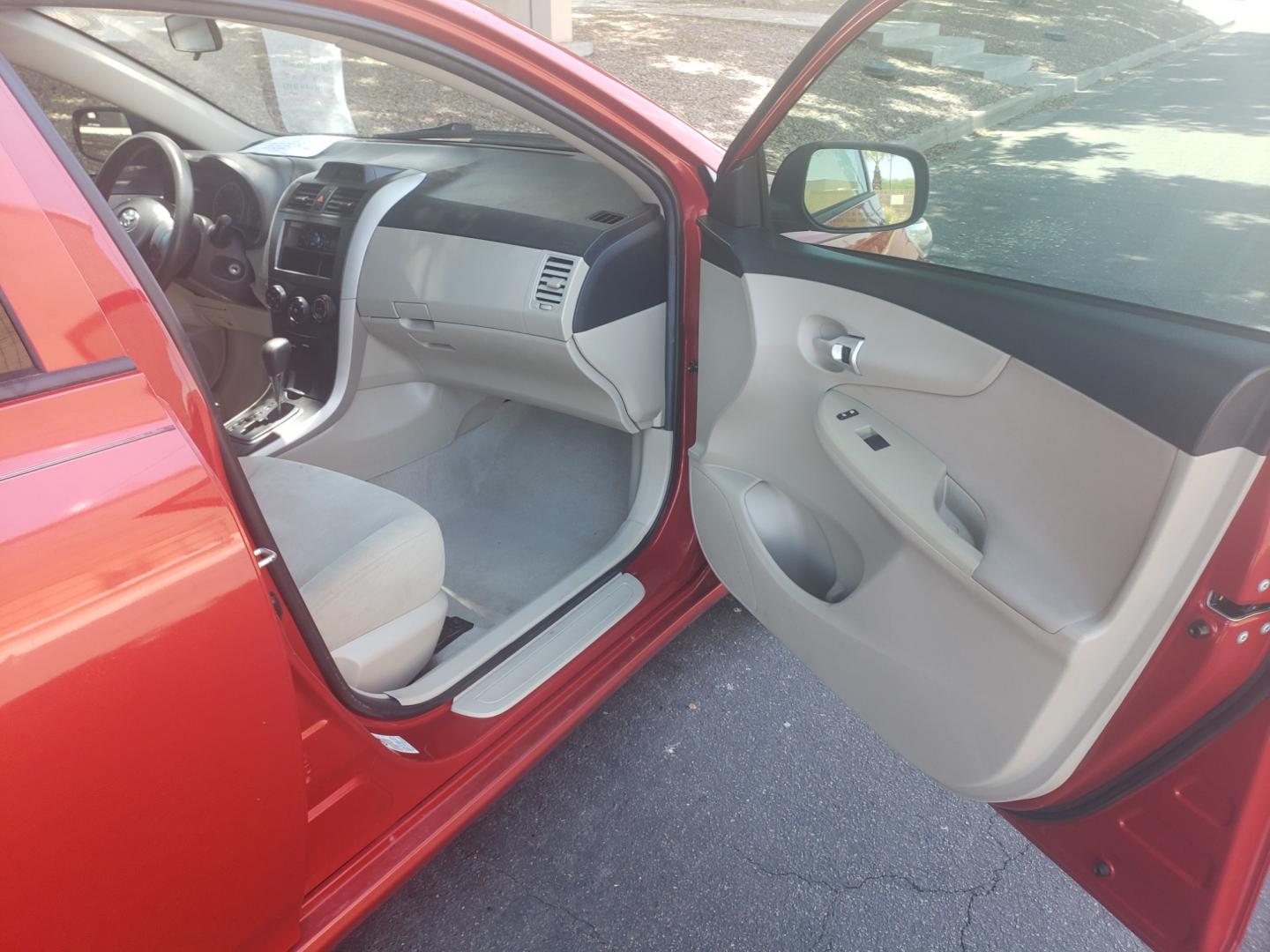 2012 /Tan and black Toyota Corolla l (5YFBU4EE0CP) with an 1.8L L4 DOHC 16V engine, 4-Speed Automatic transmission, located at 323 E Dunlap Ave., Phoenix, AZ, 85020, (602) 331-9000, 33.567677, -112.069000 - Photo#11