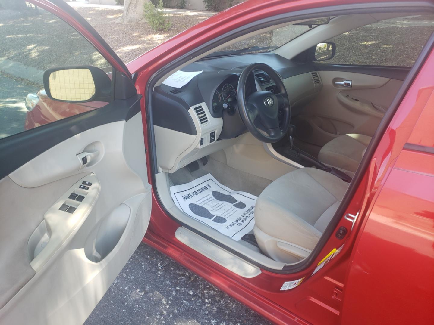 2012 /Tan and black Toyota Corolla l (5YFBU4EE0CP) with an 1.8L L4 DOHC 16V engine, 4-Speed Automatic transmission, located at 323 E Dunlap Ave., Phoenix, AZ, 85020, (602) 331-9000, 33.567677, -112.069000 - Photo#7