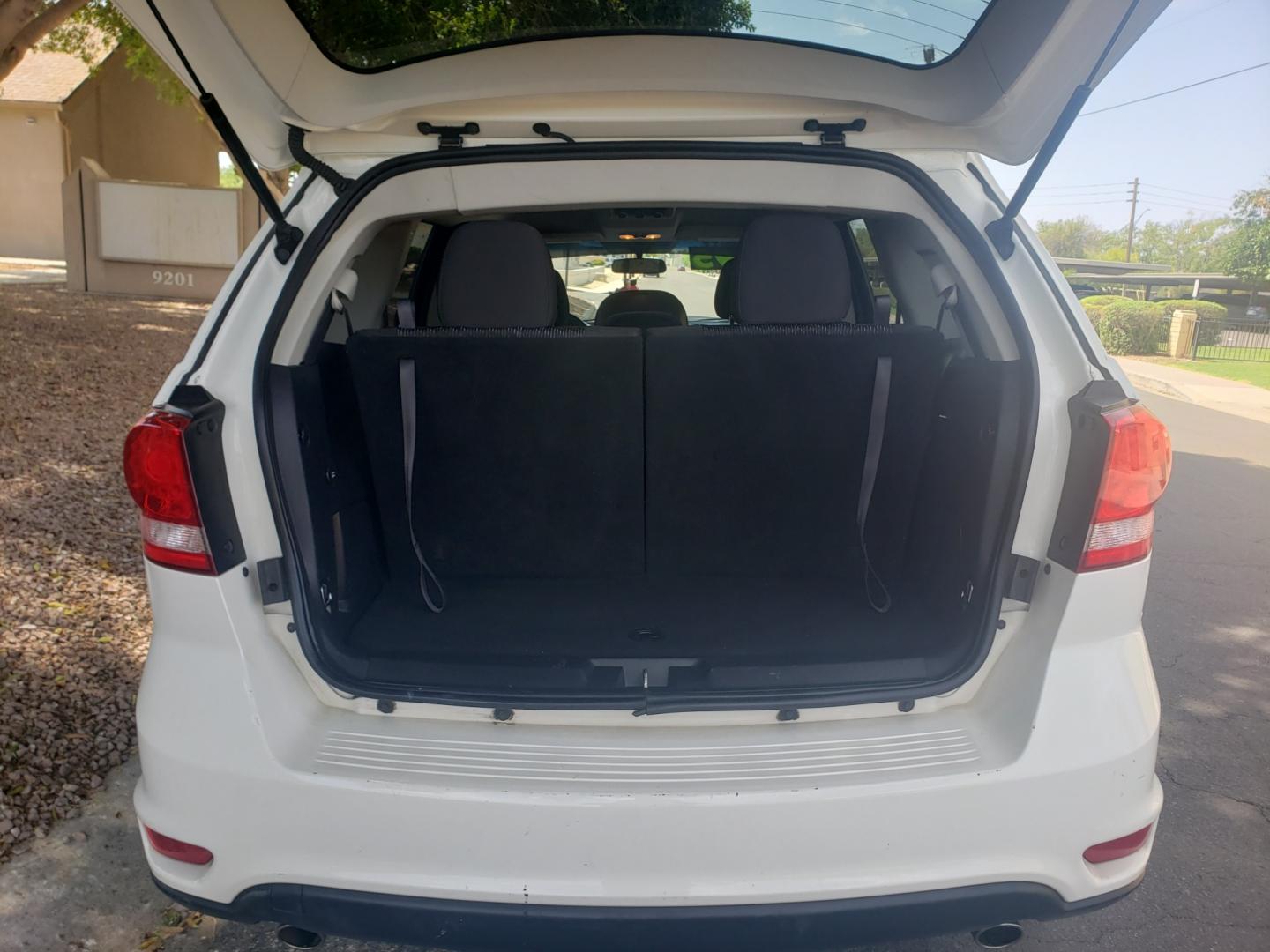 2016 WHITE /gray and black Dodge Journey SXT (3C4PDCBG6GT) with an 3.6L V6 DOHC 24V engine, 6-Speed Automatic transmission, located at 323 E Dunlap Ave., Phoenix, AZ, 85020, (602) 331-9000, 33.567677, -112.069000 - 2016 Dodge Journey FWD 4dr SXT,……..EXCELLENT condition,......Ice Cold A/C, Clean Black and gray interior with black cloth seats in near perfect condition, 3RD row seating, Rear AC, New brakes, Tune up, Stereo/CD Player, Bluetooth, Phone sync, Satellite compatible, This suv is gorgeous inside and - Photo#17