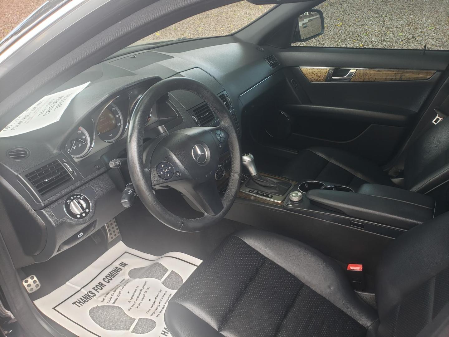 2009 /black Mercedes-Benz C-Class C350 Sport Sedan (WDDGF56X89R) with an 3.5L V6 DOHC 24V engine, 7-Speed Automatic transmission, located at 323 E Dunlap Ave., Phoenix, AZ, 85020, (602) 331-9000, 33.567677, -112.069000 - 2009 Mercedes-Benz C-Class C350 Sport Sedan,......A True Must See!! No accidents, IceCold AC Front and Rear, The car is gorgeous inside and out, power windows, power door locks, Gorgeous tinted sunroof, Stereo/Cd Player, Phone sync, Bluetooth, Backup camera, Clean Black Interior with beautiful Black - Photo#9