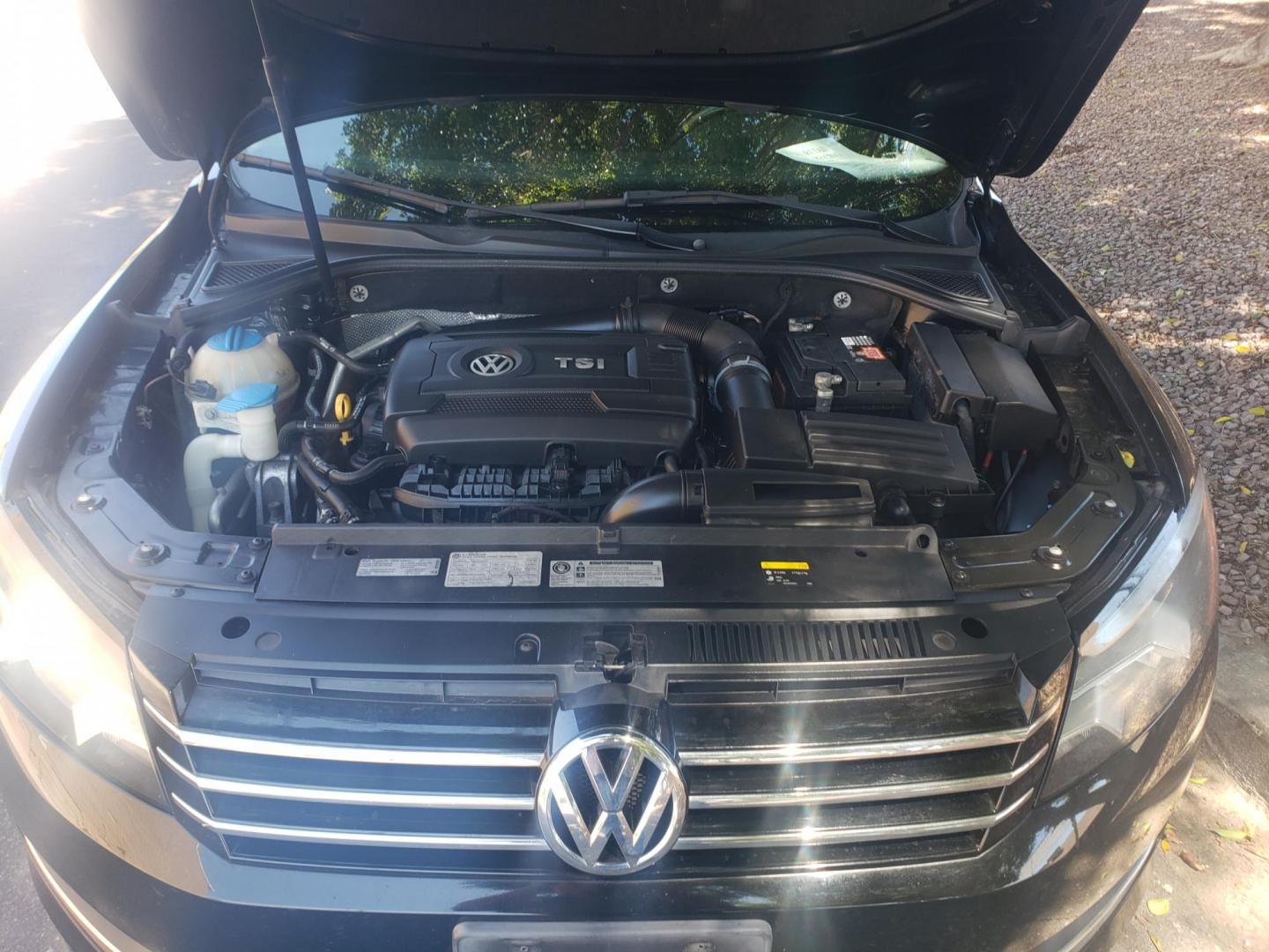 2015 /black Volkswagen Passat Wolfsburg Edition 6A (1VWAT7A37FC) with an 1.8L L4 TURBO DIESEL engine, 6-Speed Automatic transmission, located at 323 E Dunlap Ave., Phoenix, AZ, 85020, (602) 331-9000, 33.567677, -112.069000 - 2015 Volkswagen Passat,......A Must See!!..... No accidents,.... Ice cold AC. The car is gorgeous inside and out. Power windows, Power door locks, Stereo/CD Player, Phone sync, Bluetooth, Backup camera, Beautiful gray and Black interior with Black leather seats in near perfect condition, Incredible - Photo#16