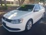 2012 WHITE /gray and black Volkswagen Jetta SE (3VWDP7AJ0CM) with an 2.5L L5 DOHC 20V engine, 6-Speed Automatic transmission, located at 323 E Dunlap Ave., Phoenix, AZ, 85020, (602) 331-9000, 33.567677, -112.069000 - 2012 Volkswagen Jetta SE,......A Must See!!..... No accidents,..... Ice cold AC. The car is gorgeous inside and out. Power windows, Power door locks, Touch screen Stereo/CD Player, Phone sync, Bluetooth, Satellite compatible, Beautiful gray and black interior with black leather seats in near perfec - Photo#0