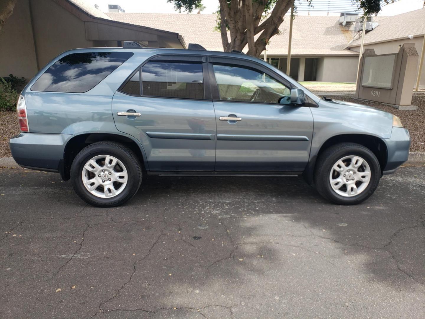 2006 BLUE /GRAY Acura MDX Touring with Navigation System (2HNYD18866H) with an 3.5L V6 SOHC 24V engine, 5-Speed Automatic Overdrive transmission, located at 323 E Dunlap Ave., Phoenix, AZ, 85020, (602) 331-9000, 33.567677, -112.069000 - 2006 Acura MDX Touring with Navigation System,…….Ice Cold A/C, Clean gray interior with gray leather seats in good condition, New brakes, Tune up, gorgeous tinted sunroof, Stereo/CD Player, Bluetooth, Phone sync, Satellite compatible, Backup camera, Navigation, side running boards, rear A/C, T - Photo#4