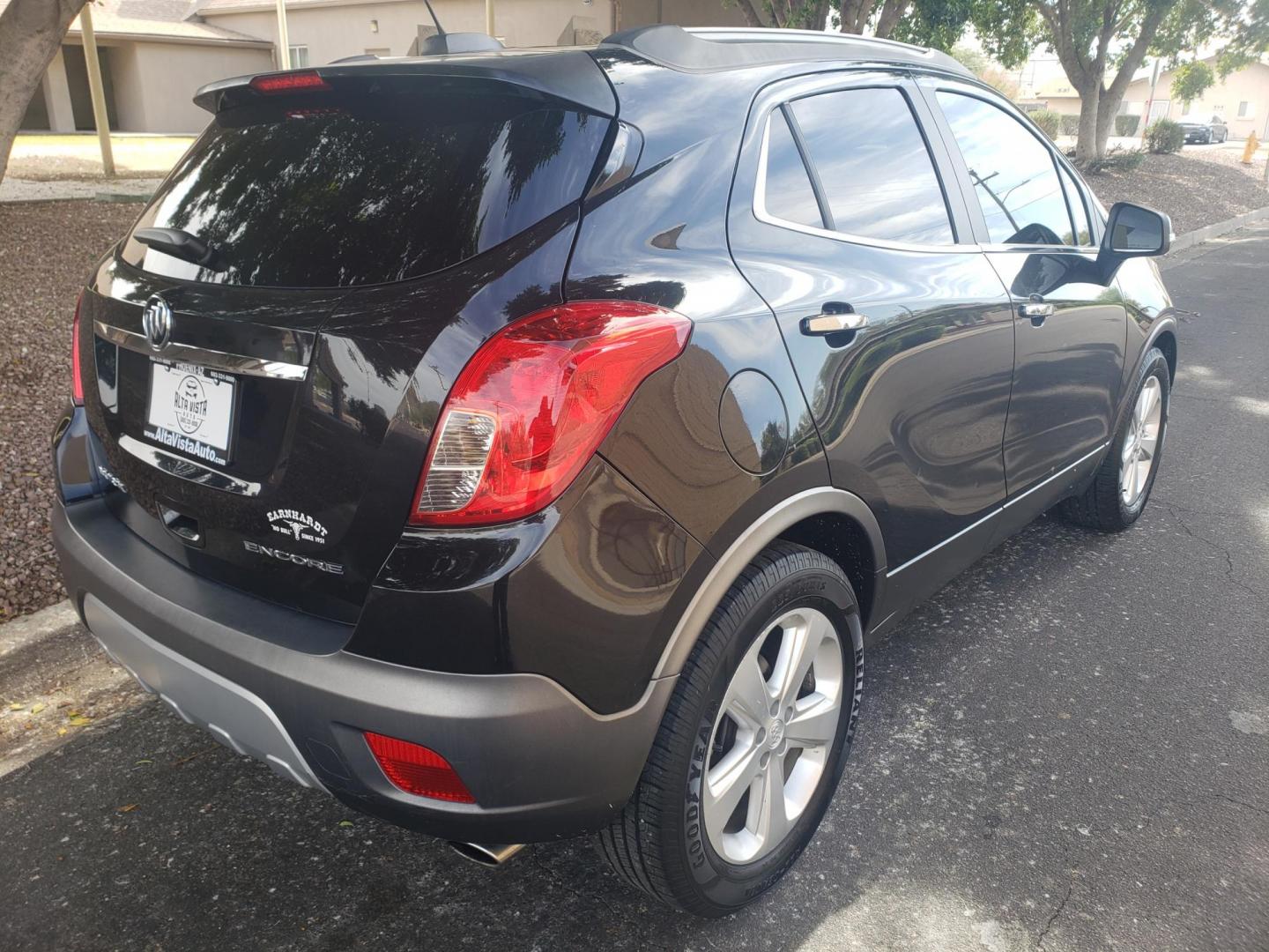 2015 black /gray and black Buick Encore Convenience FWD (KL4CJBSB9FB) with an 1.4L L4 DOHC 16V TURBO engine, 6-Speed Automatic transmission, located at 323 E Dunlap Ave., Phoenix, AZ, 85020, (602) 331-9000, 33.567677, -112.069000 - 2015 Buick Encore Convenience FWD,....EXCELLENT condition, Ice Cold A/C, Black and gray interior with black leather seats in near perfect condition, New brakes, Tune up, Stereo/CD Player, Bluetooth, Phone sync, backup camera, satellite compatible, This suv is gorgeous inside and out, Incredible ga - Photo#3