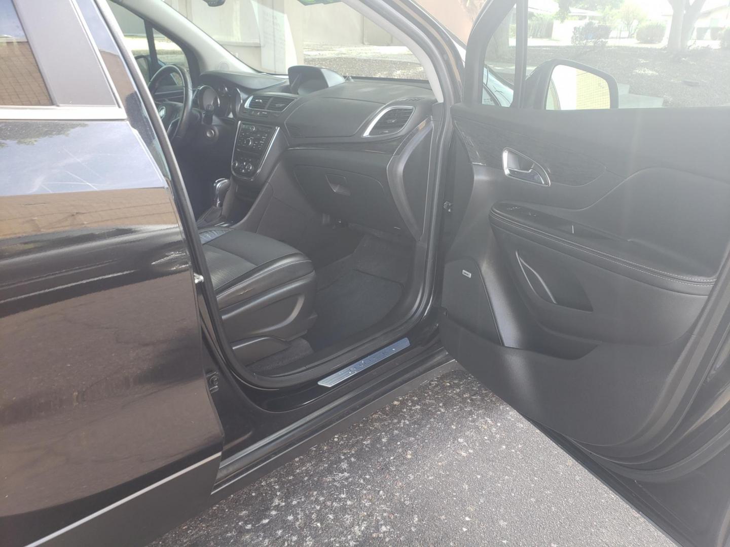 2015 black /gray and black Buick Encore Convenience FWD (KL4CJBSB9FB) with an 1.4L L4 DOHC 16V TURBO engine, 6-Speed Automatic transmission, located at 323 E Dunlap Ave., Phoenix, AZ, 85020, (602) 331-9000, 33.567677, -112.069000 - 2015 Buick Encore Convenience FWD,....EXCELLENT condition, Ice Cold A/C, Black and gray interior with black leather seats in near perfect condition, New brakes, Tune up, Stereo/CD Player, Bluetooth, Phone sync, backup camera, satellite compatible, This suv is gorgeous inside and out, Incredible ga - Photo#12