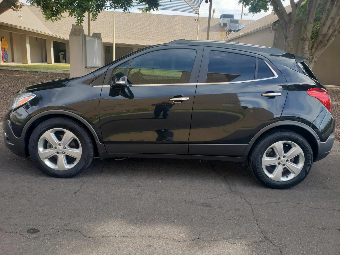 2015 black /gray and black Buick Encore Convenience FWD (KL4CJBSB9FB) with an 1.4L L4 DOHC 16V TURBO engine, 6-Speed Automatic transmission, located at 323 E Dunlap Ave., Phoenix, AZ, 85020, (602) 331-9000, 33.567677, -112.069000 - 2015 Buick Encore Convenience FWD,....EXCELLENT condition, Ice Cold A/C, Black and gray interior with black leather seats in near perfect condition, New brakes, Tune up, Stereo/CD Player, Bluetooth, Phone sync, backup camera, satellite compatible, This suv is gorgeous inside and out, Incredible ga - Photo#6