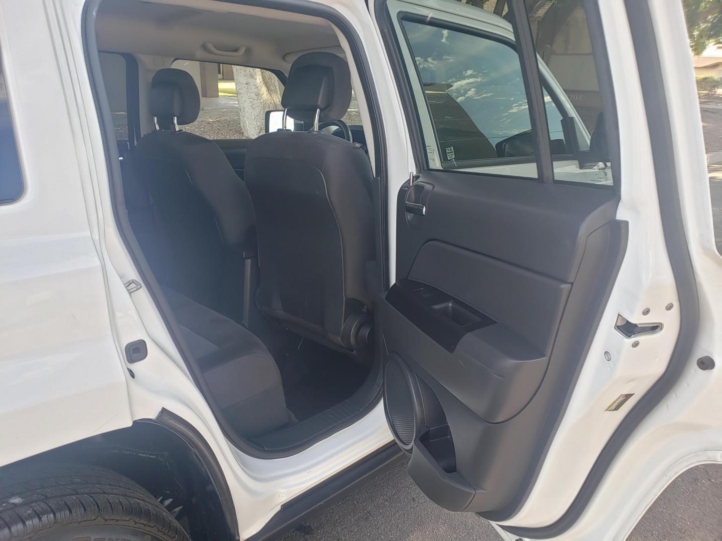 2015 WHITE /gray and black Jeep Patriot Sport 2WD (1C4NJPBA8FD) with an 2.0L L4 DOHC 16V engine, automatic transmission, located at 323 E Dunlap Ave., Phoenix, AZ, 85020, (602) 331-9000, 33.567677, -112.069000 - 2015 Jeep Patriot Sport 2WD,…….Ice Cold A/C, Clean gray and black interior with black cloth seats in good condition, New brakes, Tune up, Stereo/CD Player, Bluetooth, Phone sync, Satellite compatible, This SUV is gorgeous inside and out, Incredible gas mileage! Arizona title , Runs and Drives Ex - Photo#12