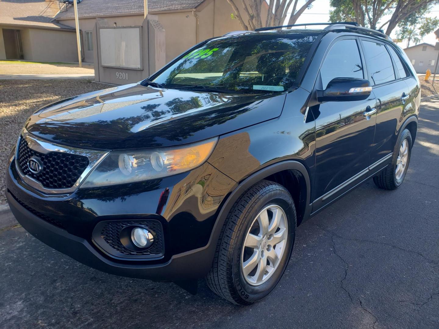 2012 black /gray and black Kia Sorento LX 2WD (5XYKT4A2XCG) with an 3.5L V6 DOHC 24V engine, 6-Speed Automatic transmission, located at 323 E Dunlap Ave., Phoenix, AZ, 85020, (602) 331-9000, 33.567677, -112.069000 - 2012 Kia Sorento LX 2WD,....EXCELLENT condition, .....OLNY 98K MILES!!!!.......... Ice Cold A/C, Black and gray interior with black cloth seats in near perfect condition, New brakes, Tune up, Stereo/CD Player, Bluetooth, Phone sync, backup camera, satellite compatible, MP3 Player, 3RD row seating, T - Photo#0