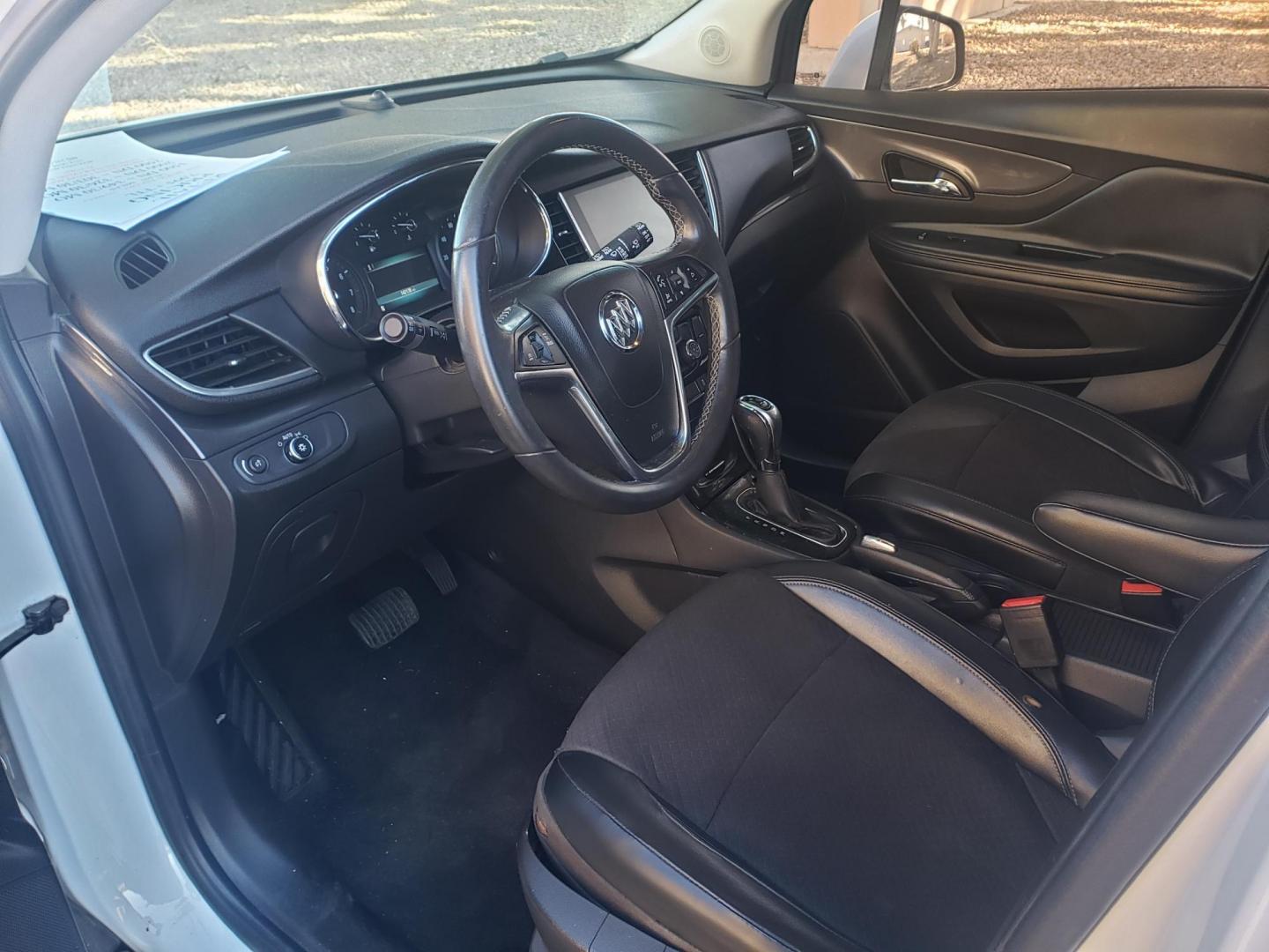 2018 WHITE /gray and black Buick Encore Preferred FWD (KL4CJASB0JB) with an 1.4L L4 DOHC 16V TURBO engine, 6A transmission, located at 323 E Dunlap Ave., Phoenix, AZ, 85020, (602) 331-9000, 33.567677, -112.069000 - 2018 Buick Encore Preferred FWD,....EXCELLENT condition, Ice Cold A/C, Black and gray interior with black leather seats in near perfect condition, New brakes, Tune up, Stereo/CD Player, Bluetooth, Phone sync, backup camera, satellite compatible, This suv is gorgeous inside and out, Incredible gas mi - Photo#9