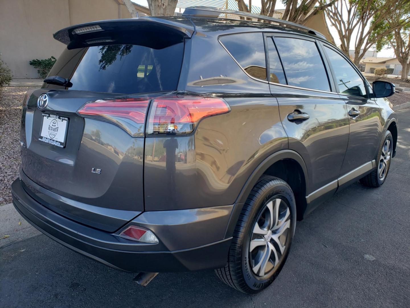 2017 gray /gray and black Toyota RAV4 LE FWD (2T3ZFREV2HW) with an 2.5L L4 DOHC 16V engine, 6A transmission, located at 323 E Dunlap Ave., Phoenix, AZ, 85020, (602) 331-9000, 33.567677, -112.069000 - Photo#3