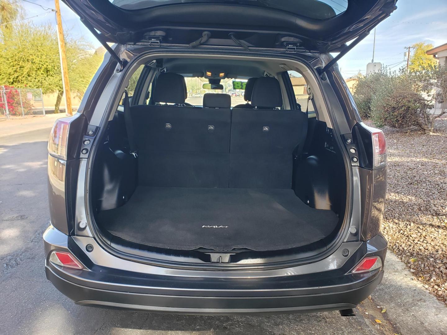 2017 gray /gray and black Toyota RAV4 LE FWD (2T3ZFREV2HW) with an 2.5L L4 DOHC 16V engine, 6A transmission, located at 323 E Dunlap Ave., Phoenix, AZ, 85020, (602) 331-9000, 33.567677, -112.069000 - Photo#16