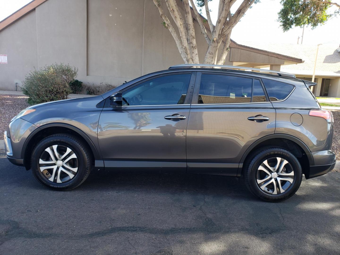 2017 gray /gray and black Toyota RAV4 LE FWD (2T3ZFREV2HW) with an 2.5L L4 DOHC 16V engine, 6A transmission, located at 323 E Dunlap Ave., Phoenix, AZ, 85020, (602) 331-9000, 33.567677, -112.069000 - Photo#6