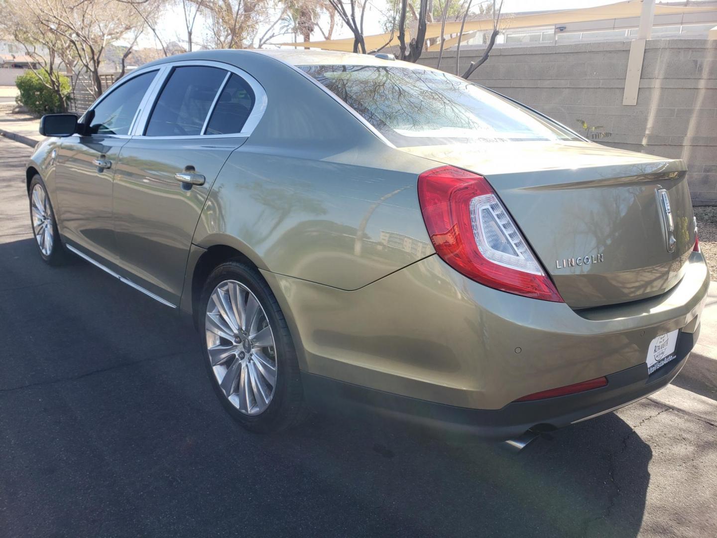 2013 gold /Tan and black Lincoln MKS EcoBoost AWD (1LNHL9FT6DG) with an 3.5L V6 DOHC 24V engine, 6-Speed Automatic transmission, located at 323 E Dunlap Ave., Phoenix, AZ, 85020, (602) 331-9000, 33.567677, -112.069000 - Photo#5