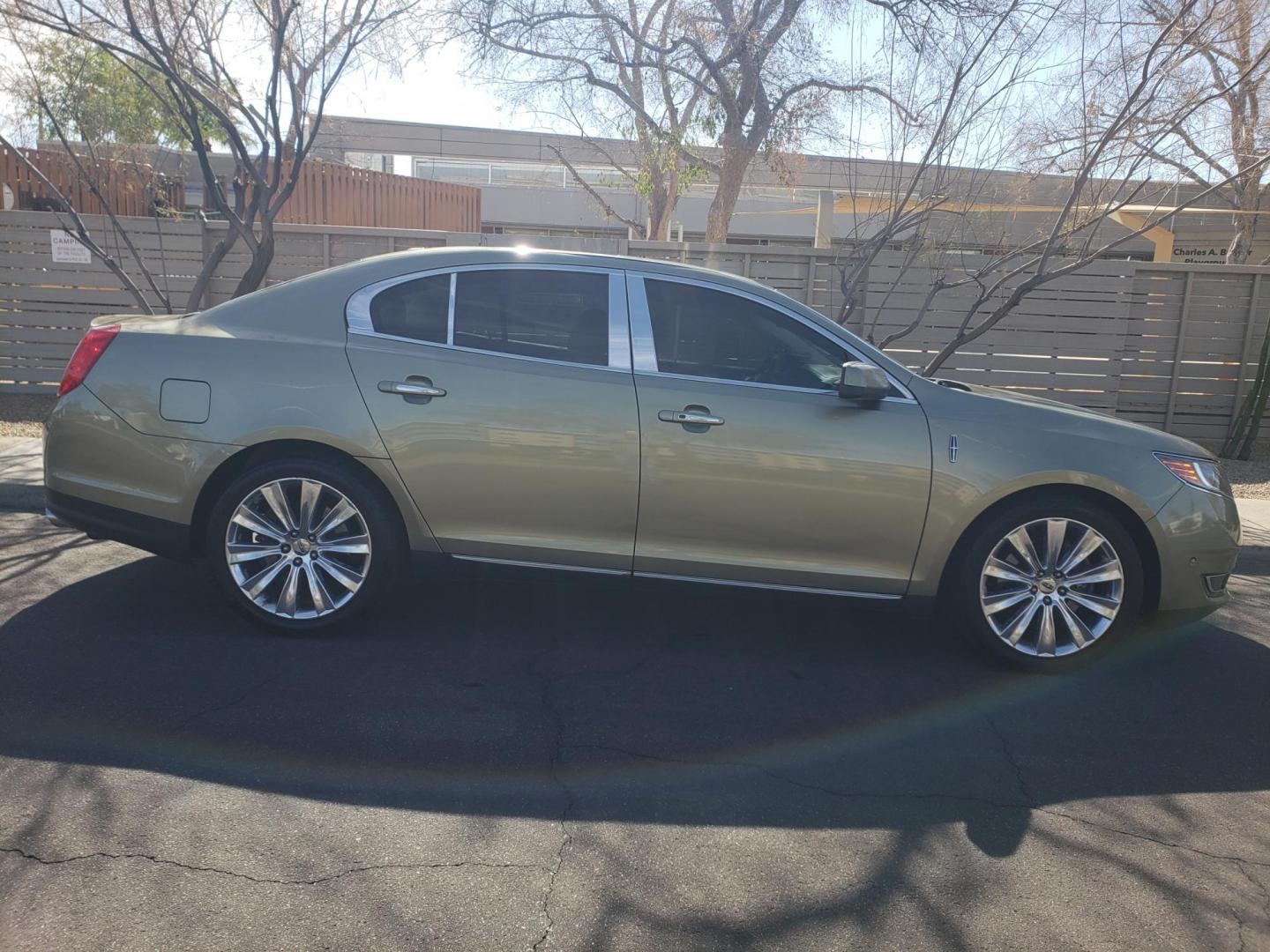 2013 gold /Tan and black Lincoln MKS EcoBoost AWD (1LNHL9FT6DG) with an 3.5L V6 DOHC 24V engine, 6-Speed Automatic transmission, located at 323 E Dunlap Ave., Phoenix, AZ, 85020, (602) 331-9000, 33.567677, -112.069000 - Photo#4