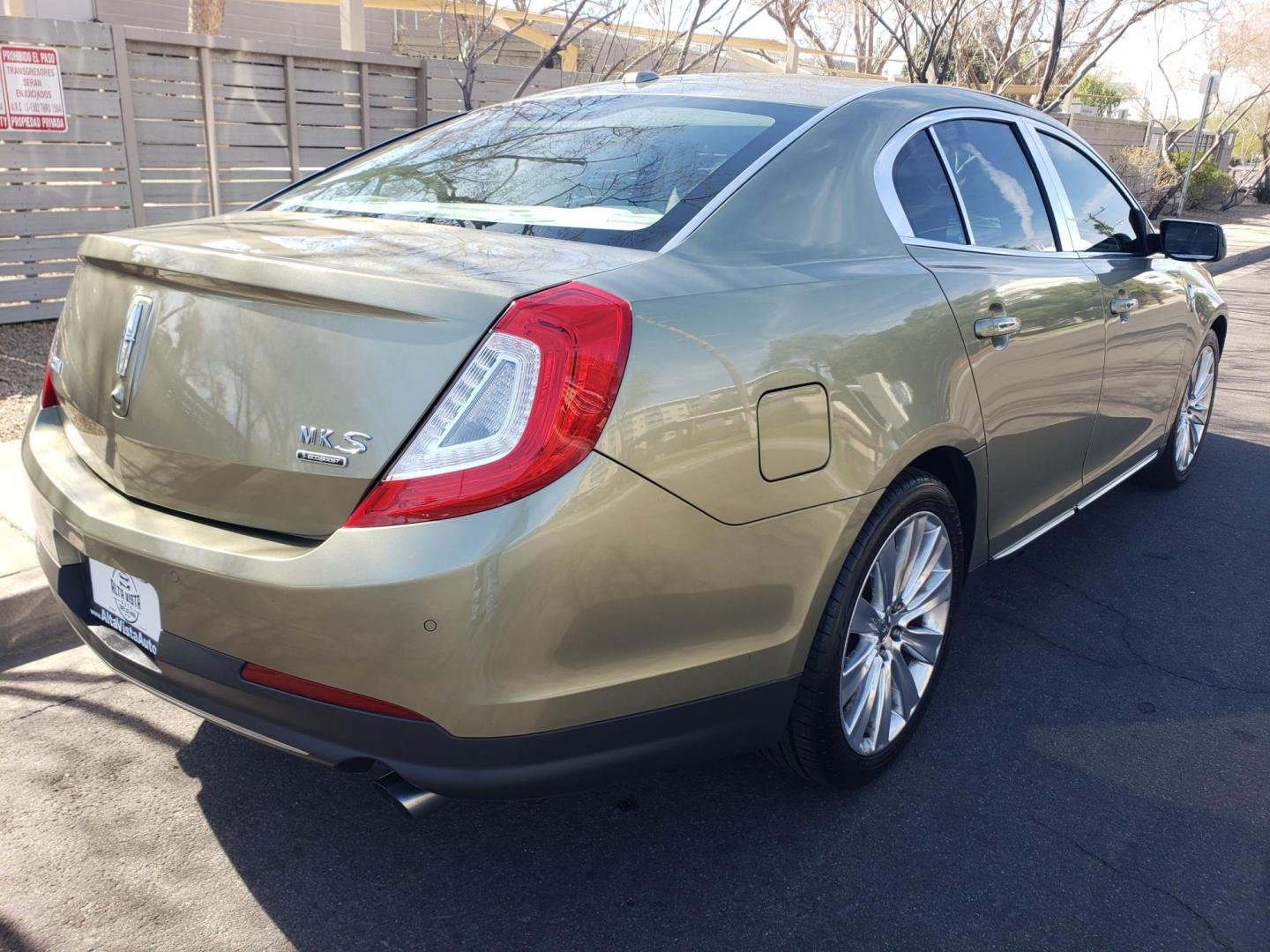 2013 gold /Tan and black Lincoln MKS EcoBoost AWD (1LNHL9FT6DG) with an 3.5L V6 DOHC 24V engine, 6-Speed Automatic transmission, located at 323 E Dunlap Ave., Phoenix, AZ, 85020, (602) 331-9000, 33.567677, -112.069000 - Photo#3