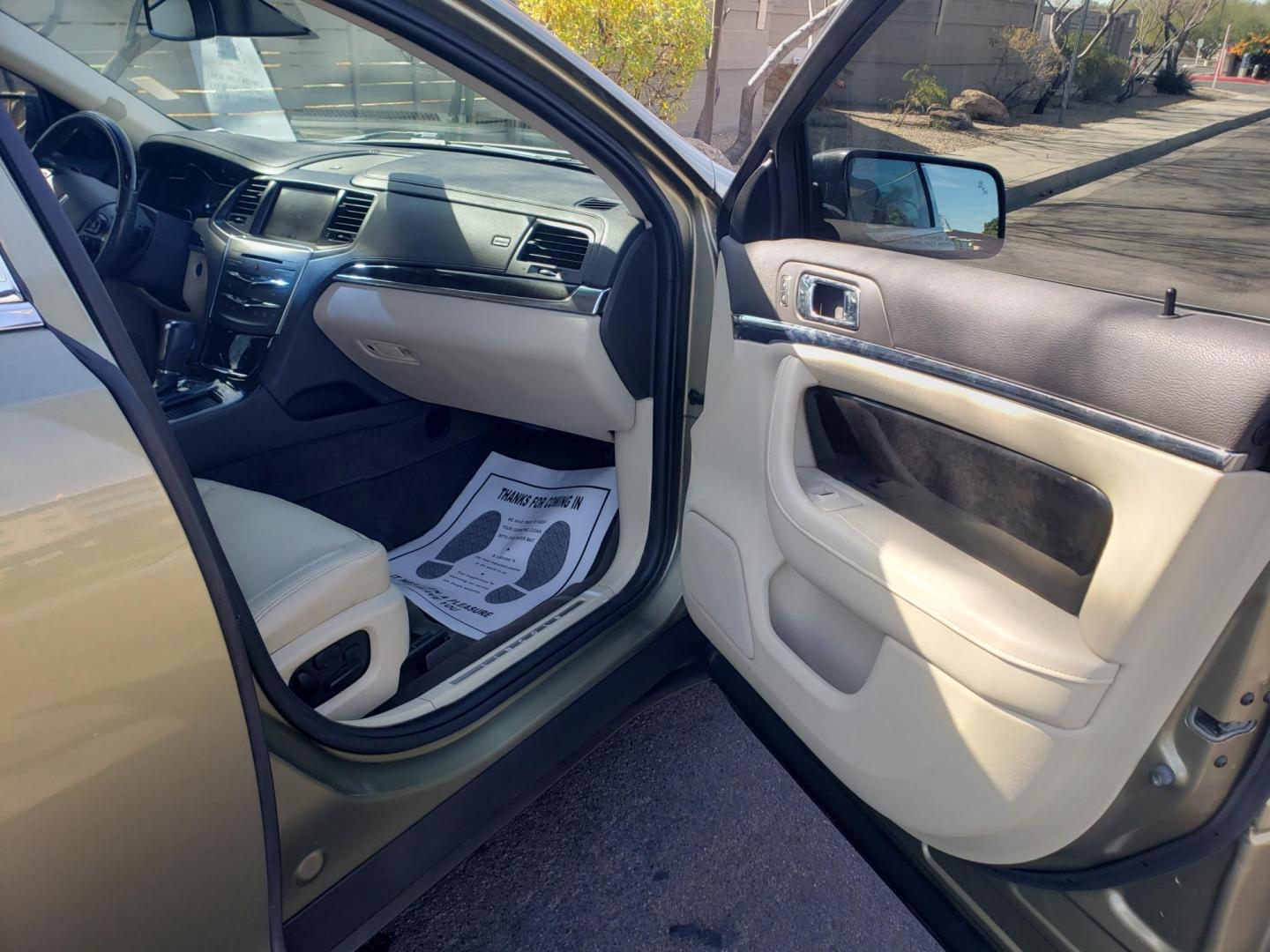 2013 gold /Tan and black Lincoln MKS EcoBoost AWD (1LNHL9FT6DG) with an 3.5L V6 DOHC 24V engine, 6-Speed Automatic transmission, located at 323 E Dunlap Ave., Phoenix, AZ, 85020, (602) 331-9000, 33.567677, -112.069000 - Photo#12