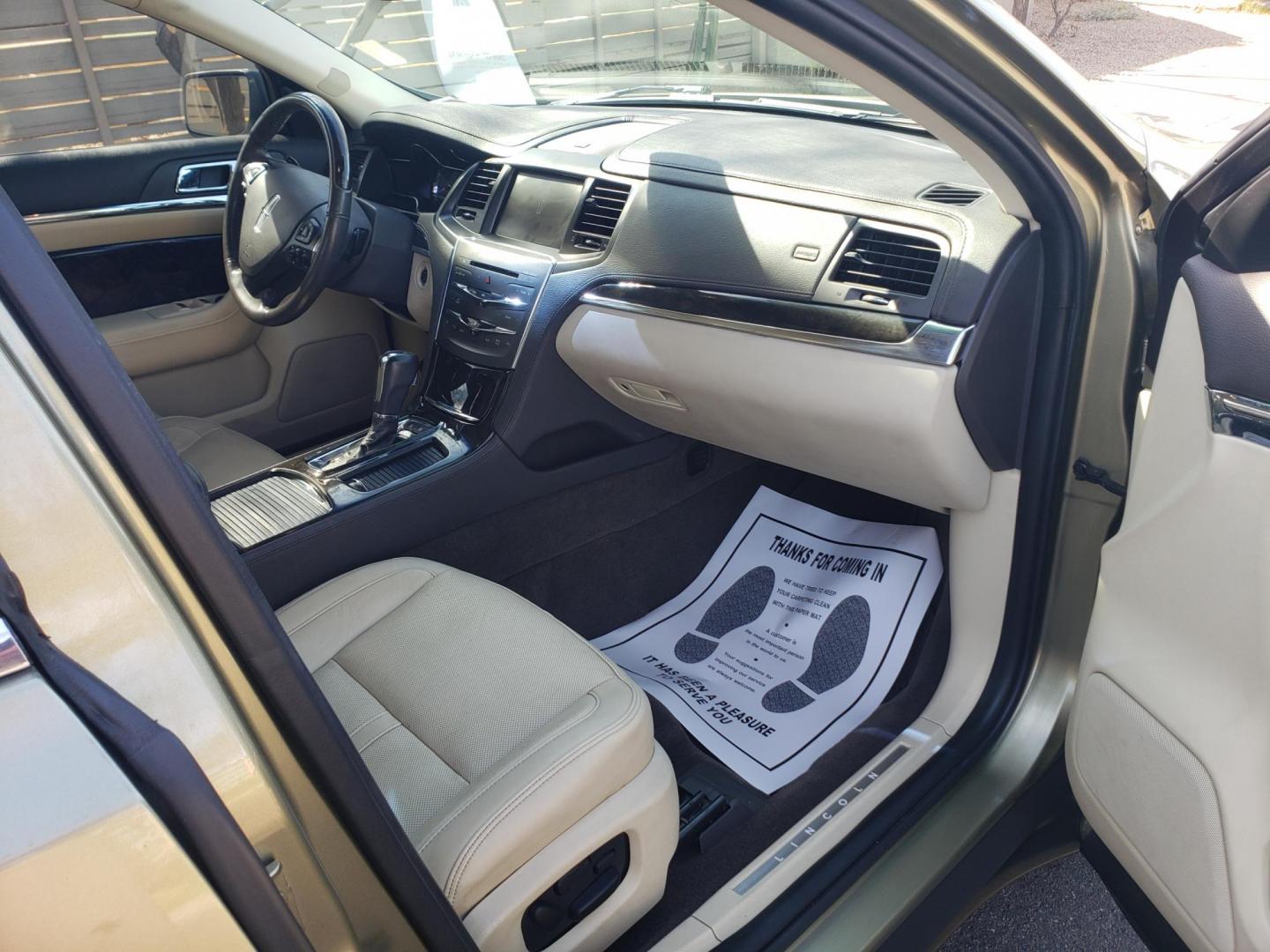 2013 gold /Tan and black Lincoln MKS EcoBoost AWD (1LNHL9FT6DG) with an 3.5L V6 DOHC 24V engine, 6-Speed Automatic transmission, located at 323 E Dunlap Ave., Phoenix, AZ, 85020, (602) 331-9000, 33.567677, -112.069000 - Photo#13