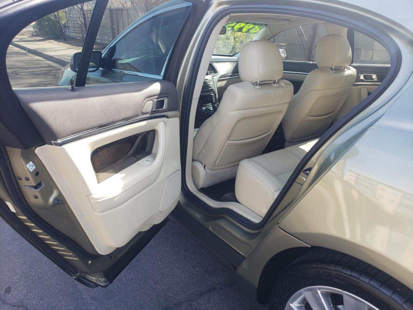 2013 gold /Tan and black Lincoln MKS EcoBoost AWD (1LNHL9FT6DG) with an 3.5L V6 DOHC 24V engine, 6-Speed Automatic transmission, located at 323 E Dunlap Ave., Phoenix, AZ, 85020, (602) 331-9000, 33.567677, -112.069000 - Photo#10